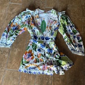 Farm Rio floral romper. Button front/tie waist. Size medium. Nwt. 100% cotton.